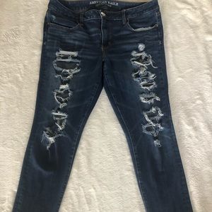 dark denim with lots of rips on upper thighs